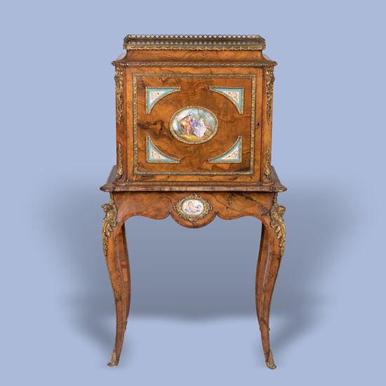 An English Porcelain Mounted Walnut Cabinet In the Louis XV Manner